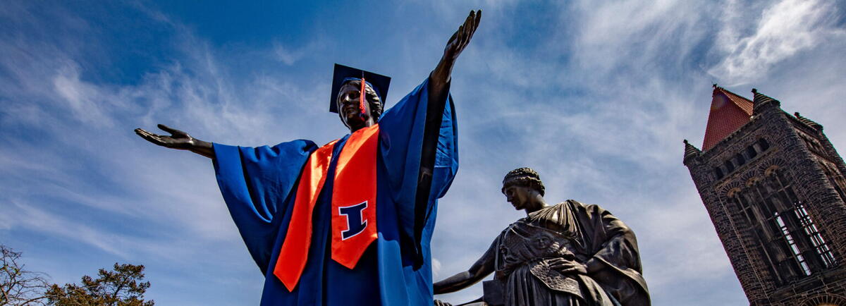 alma mater in cap and gown