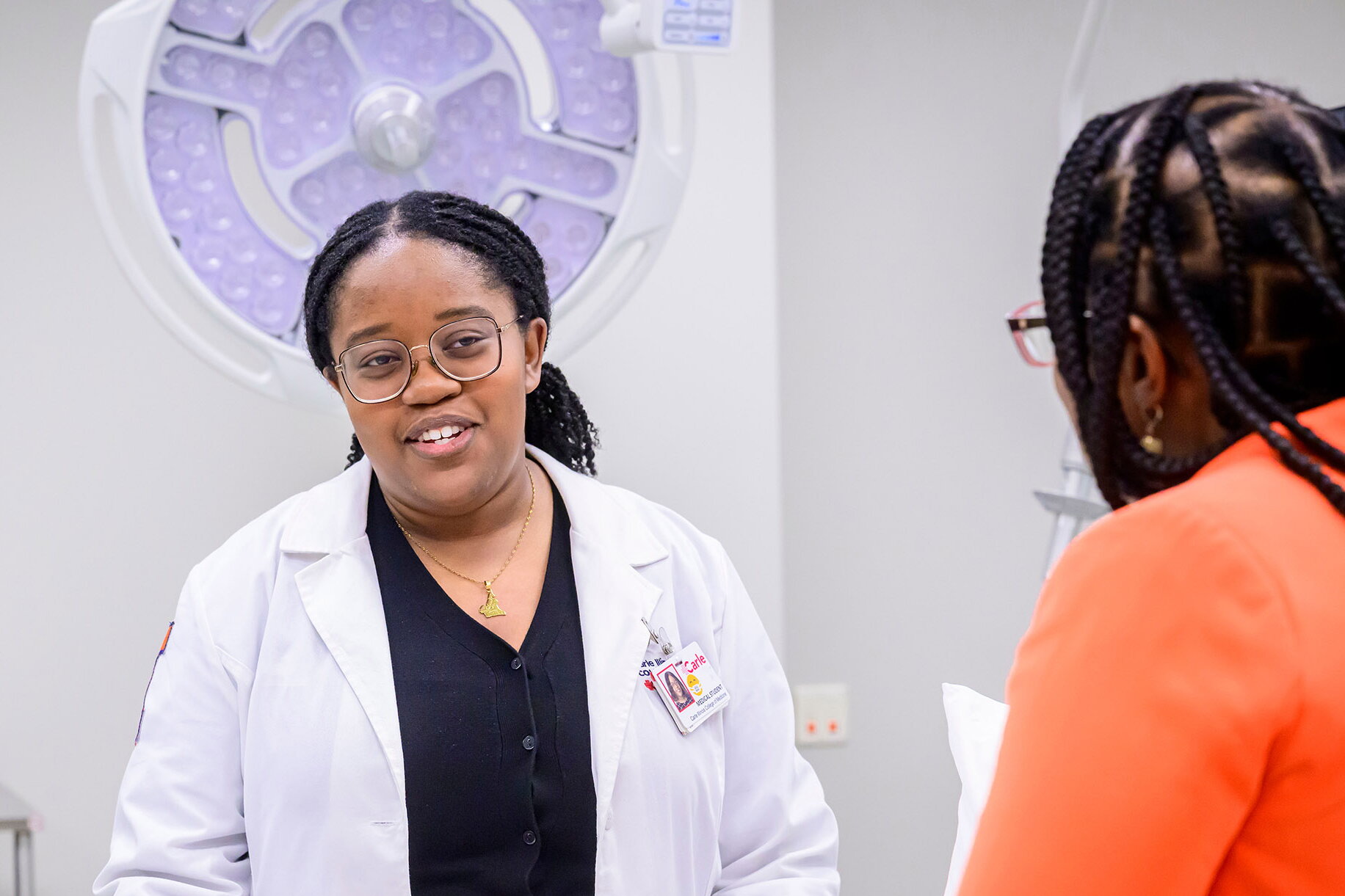 A physician talks to a patient