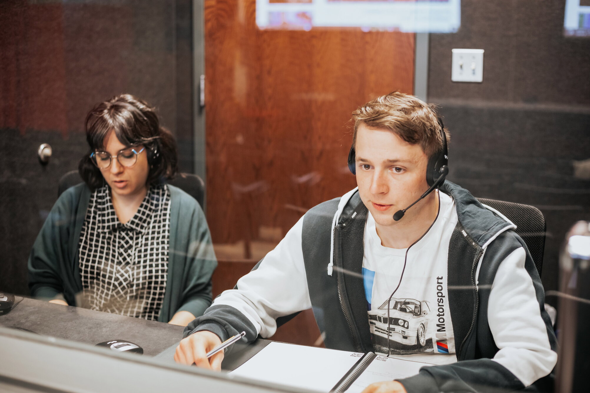 Students in a translation booth