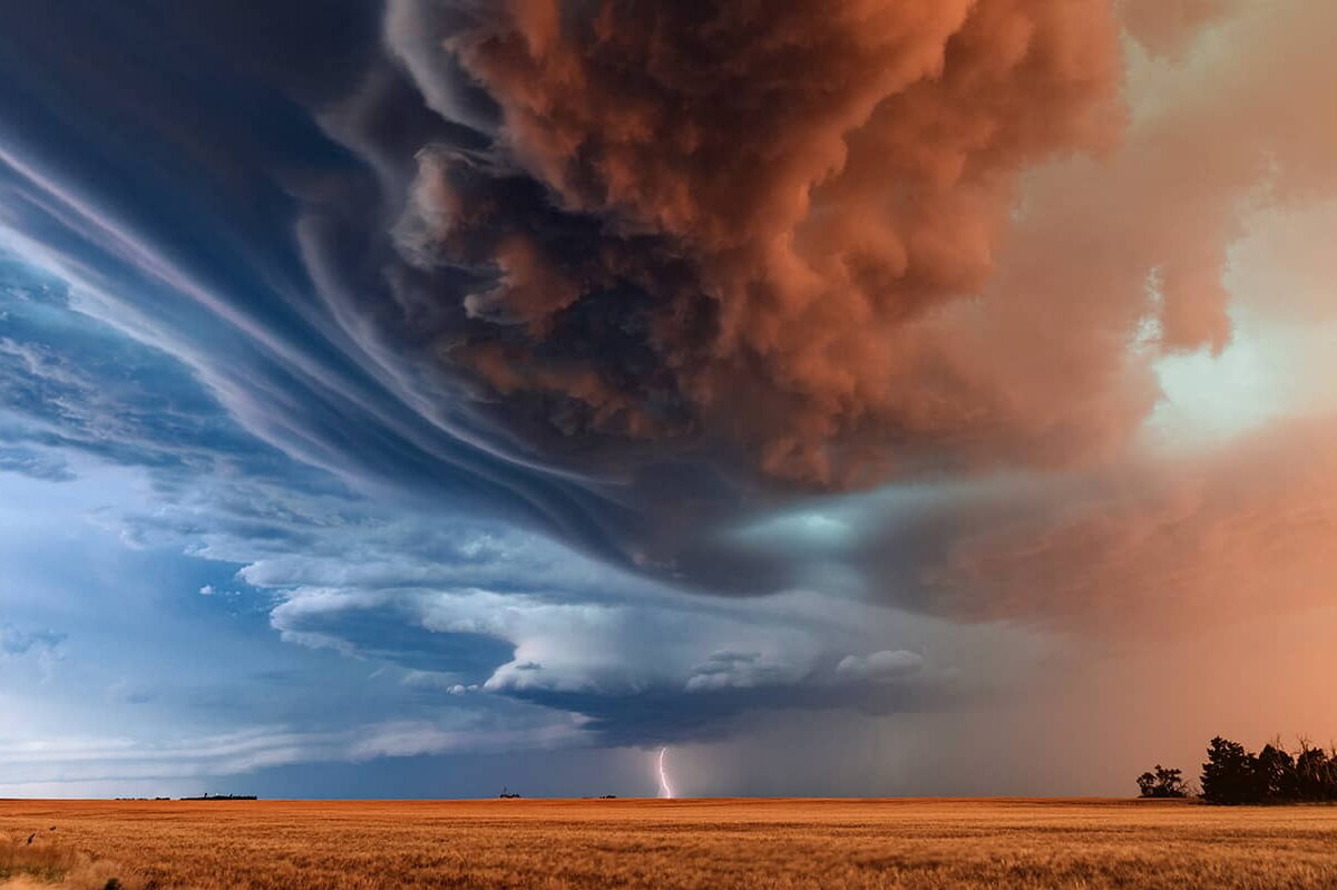 Supercell thunderstorm over field