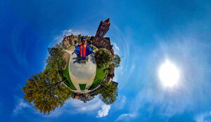 Alma Mater standing on the Earth