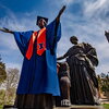 Alma mater in graduation gown