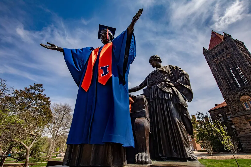 Alma mater in graduation gown
